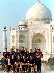 England cricket team players pose for photographers in front of the historic Taj Mahal