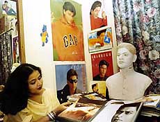 A Shah Rukh Khan's fan browses through memorabilia