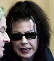 Manuela Ruda talks to her lawyer