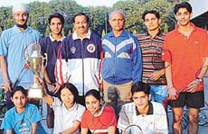 The men and women badminton teams of Panjab University, Chandigarh who excelled in the North Zone Inter-University Badminton Tournament held at Faizabad (UP).