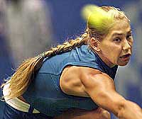 Anna Kournikova of Russia eyes the ball 