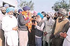 Panthic Morcha candidate Iman Singh Mann campaigns at a village