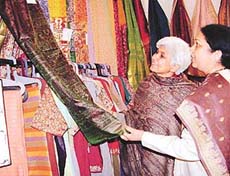 Ms Neeru Nanda, Adviser to the UT Administrator, takes a round of an exhibition by the Andhra Pradesh Handicraft Development Corporation Limited at Panchayat Bhavan in Chandigarh on Monday. 