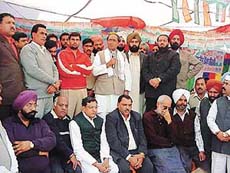 Madhya Pradesh Chief Minister Digvijay Singh addresses a rally in support of the Congress candidate from Ludhiana Rural, Mr Milkait Singh Birmi, at Sahnewal on Monday.