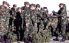 Soldiers receive last minute instructions after arriving for security detail at the Park City Olympic