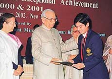 Kriti Puri receives the National Child Award for exceptional achievement, 2001, from the Vice-President, Mr Krishan Kant, in New Delhi on Tuesday.