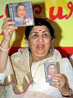 Legendary singer Lata Mangeshkar, popularly known as the Nightingale of India, shows her new album "Kabootar Kabootar"