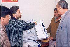 A prospective customer inquires about dummy EVMs made by a Jalandhar-based printer on Tuesday.