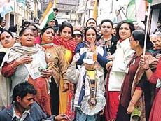 Women power: Wife of Congress candidate Surinder Dawer campaigns for her husband in Ludhiana East on Thursday.