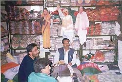 Cut-outs of different leaders are on sale