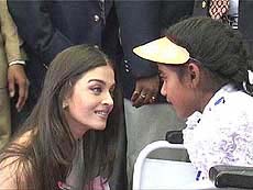 Aishwarya Rai talks to a polio-affected girl