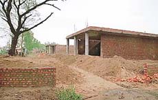 Showrooms being constructed along the Chandigarh-Fatehgarh Sahib road at Landran village.