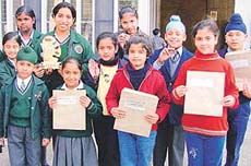 Some of the prize winners of the All-India Camel Colour Contest 2001 after the prize-distribution function in Government Museum, Sector 10, on Saturday.