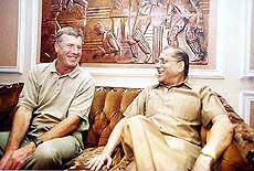 Indian cricket coach John Wright shares a joke with BCCI President Jagmohan Dalmiya