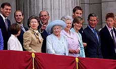 Queen Elizabeth the Queen Mother stands with members of the Royal family