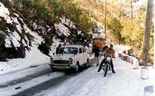 Vehicles are seen stranded