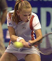 Jelena Dokic of Yugoslavia returns a backhand to Monica Seles of the USA during their semifinal of the Gaz de France Tennis Tournament at Coubertin Stadium in Paris on Saturday.