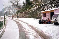 A view of the Mall Road in Mussoorie on Sunday after heavy snowfall.