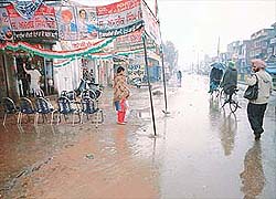 This party office wears a deserted look during a downpour 