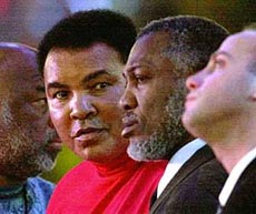 Boxing legends Muhammad Ali and Joe Frazier.