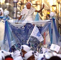 The president of the Brazilian Mahatma Gandhi institute, Agnaldo Silva, parades 