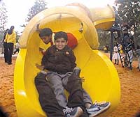 Children enjoying at the new-look Children�s Park at India Gate inaugurated by Chief Minister Sheila Dikshit