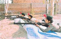 NCC cadets busy in target practice at a firing range in Abohar.