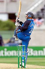 England's captain Nasser Hussain pulls a ball 