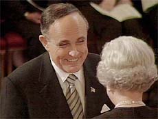 Former Mayor of New York Rudolph Giuliani receives an honorary knighthood from Britain's Queen Elizabeth II 