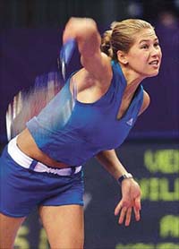 Russian Anna Kournikova serves to U.S. Venus Williams