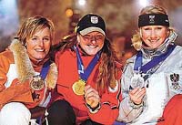 Olympic alpine women's combined champion Janica Kostelic (C) of Croatia, silver medallist Renate Goetschl (R) of Austria and bronze medallist Martina Ertl of Germany 