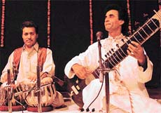 Khalil Gudaz and Ustad Fazal Ahmed Khan perform at a programme in Pracheen Kala Kendra, Chandigarh, on Saturday.