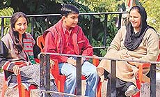 Razia Sultan, who contested from Malerkotla in the Punjab Assembly elections, relaxes with her children at her residence in Chandigarh on Sunday.