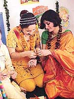 Members of the Roopika Ladies Club participate in the Basant Panchmi celebrations.