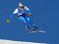 Italy's Daniela Ceccarelli speeds down the women's Super G course in Snowbasin, Utah, on Sunday at the Salt Lake City Olympics.