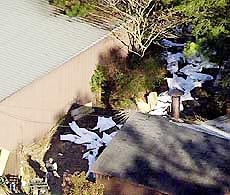 Bodies in white bags can be seen in an aerial view of the Tri-State Crematory in Noble, Georgia