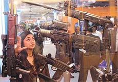 NO CHINK IN OUR ARMOUR: A girl at the DEFEXPO 2002, inaugurated at Pragati Maidan in the Capital on Tuesday. 