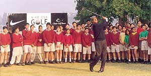 Kapil Dev inaugurating a golf clinic at the Vasant Valley School ground.