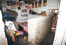 The room of a house in Gopal Nagar locality is divided into two by a wall constructed by the Railways authorities