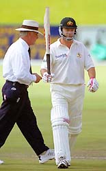 Australian Test cricket captain Steve Waugh reaches his century against South Africa on the final day of the game, played at Potchefstroom, south of Johannesburg, on Tuesday.