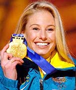Gold medal winner Alisa Camplin of Australia poses on the medals stand after receiving her gold medal for the women's Aerials Freestyle skiing in Salt Lake City, on Monday. 