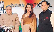 Film actress Poonam Dhillon with Jaipal Reddy and Subbi Reddy after joining the Congress during a Press conference in the Capital on Wednesday.