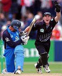 New Zealand wicket-keeper Chris Nevin celebrates