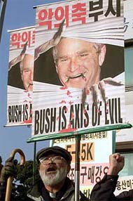 South Korean Catholic priest Mun Jong-hyon chants anti-US slogans