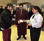 Oscar-nominated Bollywood film Lagaan�s actor and producer Aamir Khan gives autograph to his fans on his arrival in New York on Friday.