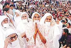 Kumari Rajni Jain with folded hands at the Jain Bhagwati Deeksha Samaroh held in Sector 16, Panchkula, on Sunday.
