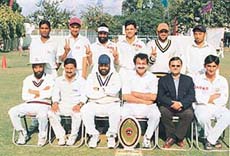 Members of the Godrej Cricket Club which won the 8th Jal Cup league Cricket Tournament played at DAV School in Chandigarh on Sunday.