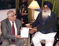 Punjab Chief Minister Parkash Singh Badal submits his resignation