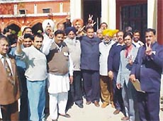 Ludhiana (West) winner Harnam Das Johar celebrates with supporters.