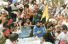 Capt Kanwaljit Singh, SAD candidate from the Banur Assembly constituency, celebrates at Dera Bassi on Sunday.